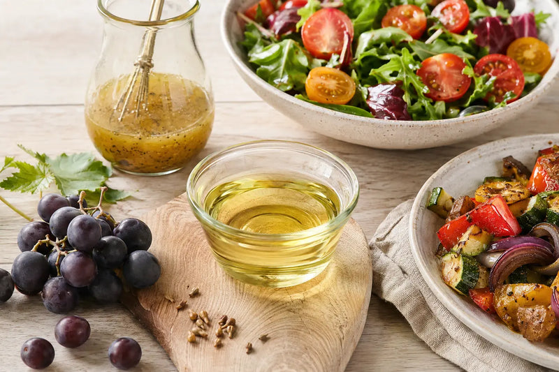 Grapeseed oil with vinaigrette, salad and roasted vegetables